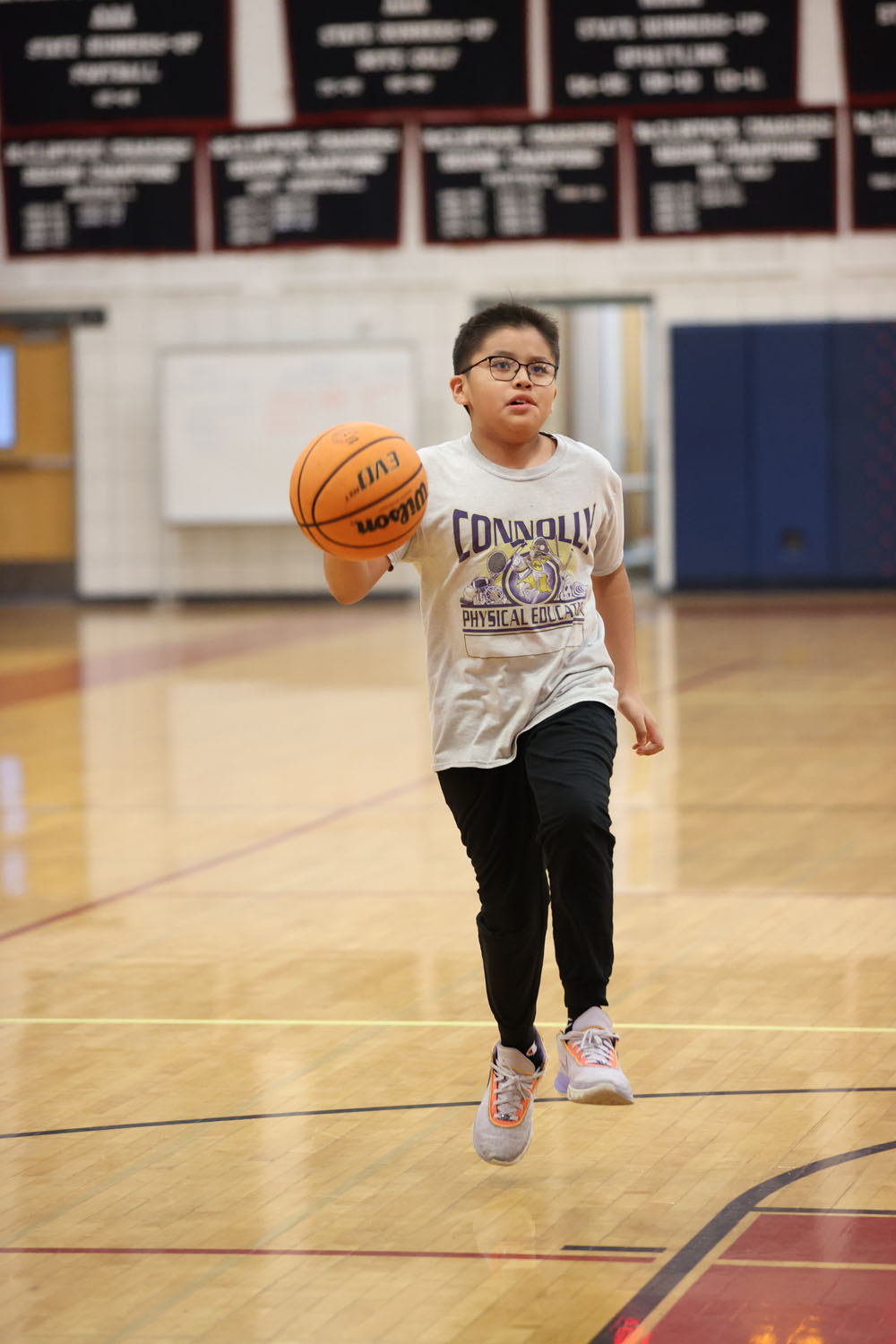 Camper going to the basket for a layup