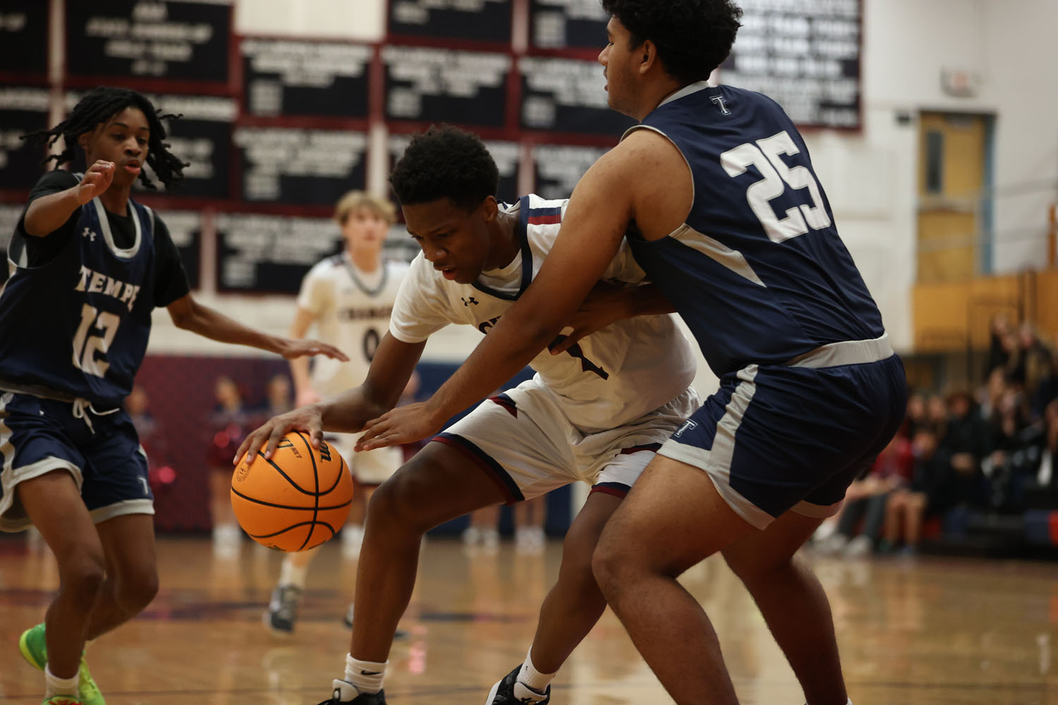 Jones fighting off the defender