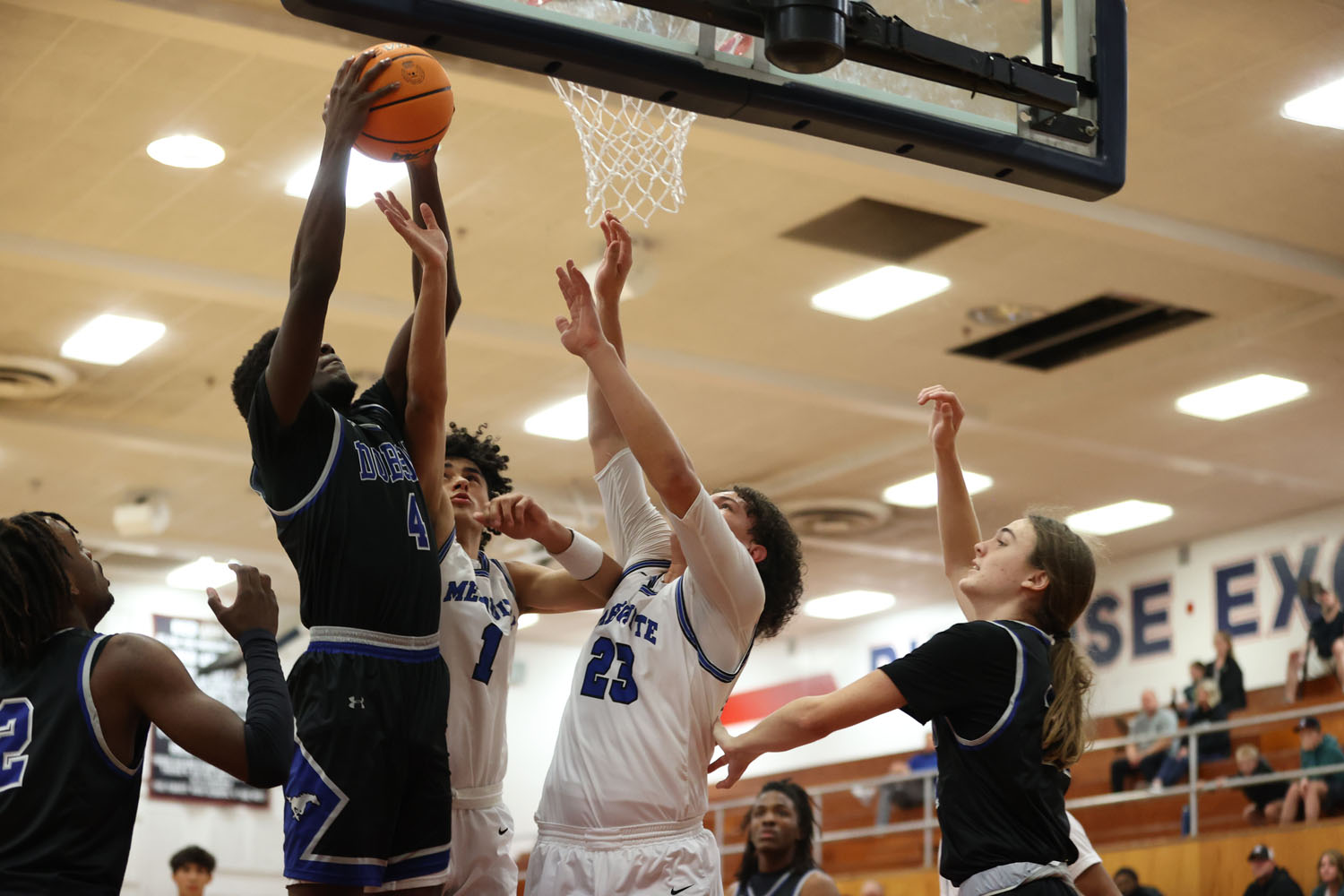 Dobson rebounding the ball