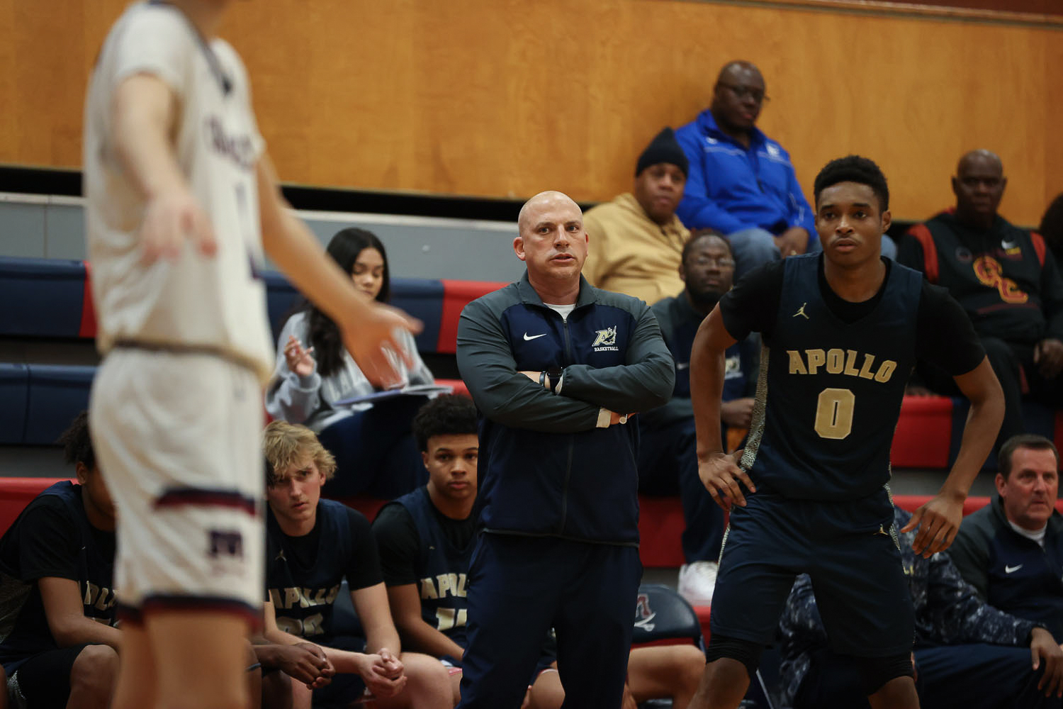 Apollo Head Coach watching his squad