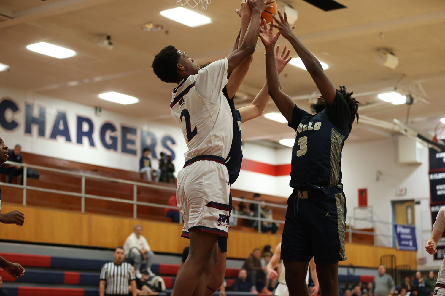 Both teams fighting for the rebound